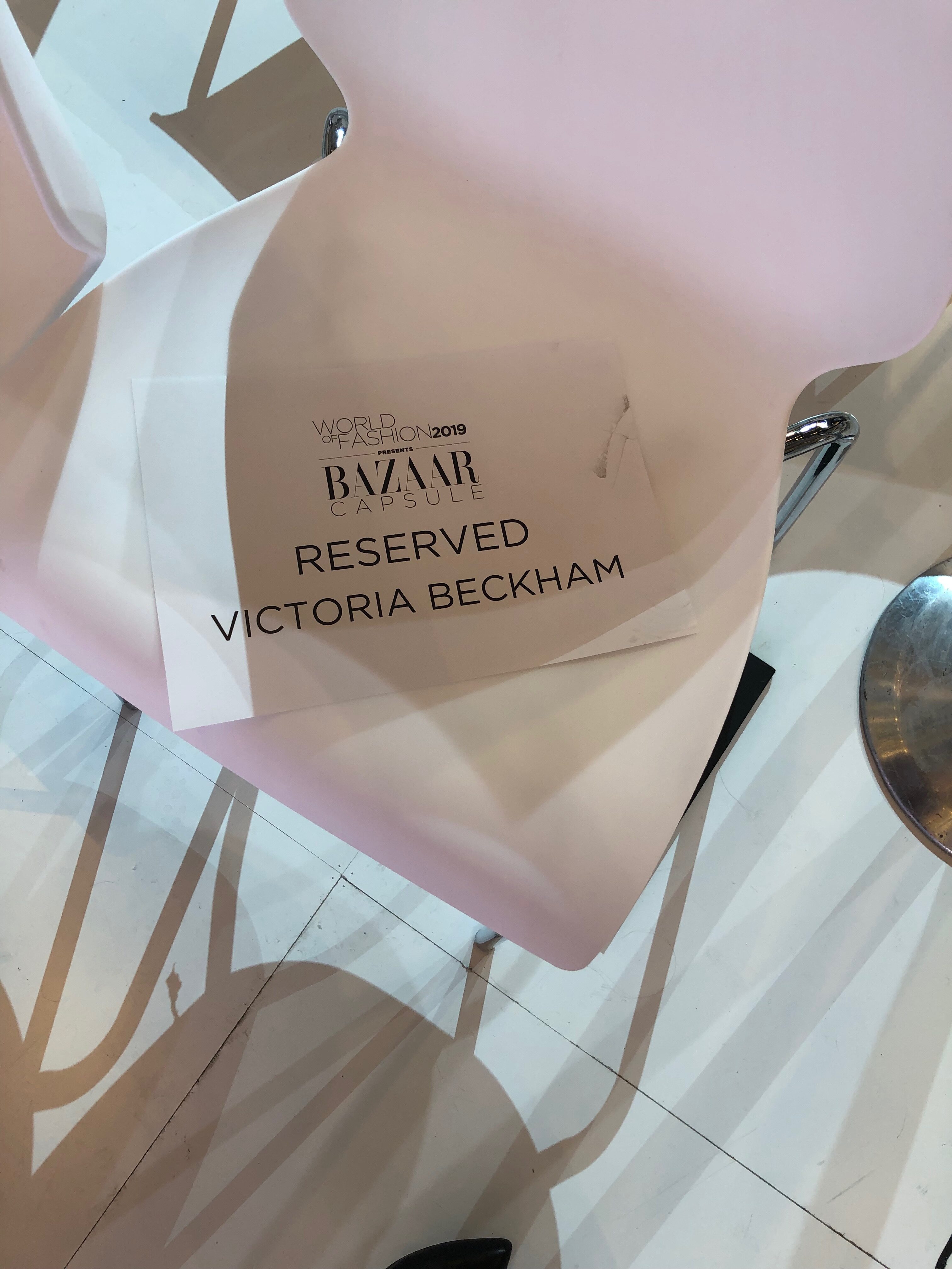 A bag of items that are labeled reserved for victoria beckham.